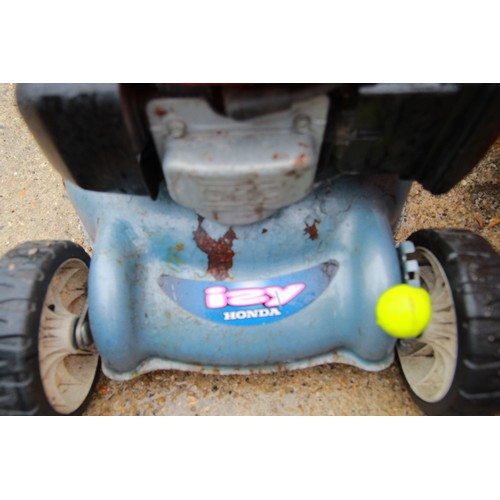 A Honda i2y Petrol Driven 4.5hp lawnmower with bag in good cosmetic condition and full working order