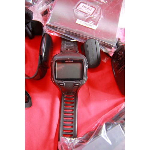 22 - A Garmin Forerunner 910XT Triathlon Runner's Watch in original box, with many accessories