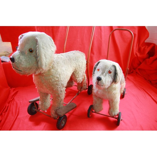 81 - Two vintage  Push Along Toy Dogs on Wheels (52)