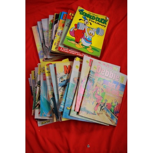 96 - A pile of girls comic books comprising Judy, Mandy, Debbie  and bunty etc, all in good condition