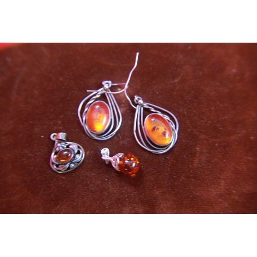 65 - Large Pair of Silver and Amber Earrings and two similar Pendants (36)