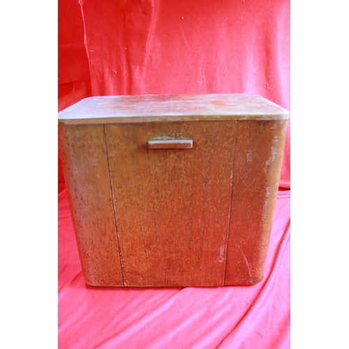 115 - A vintage 1950s wall-mounted cocktail cabinet with glasses etc