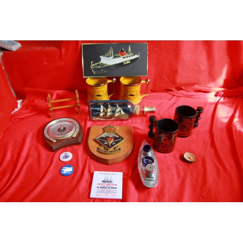 100 - An assortment of items of naval interest including a vintage ship in a bottle, an Admiralty Underwat... 