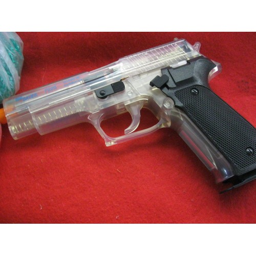 147 - A BB Gun with a quantity of BBs