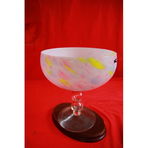 209 - A ten inch tall 8 inches wide stemmed trifle bowl in an mixed coloured opalescent glass featuring Bl... 