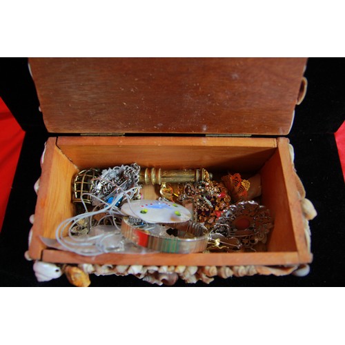 234 - A jewellery box covered in sea shells containing a quantity of 70s and 80s costume jewellery