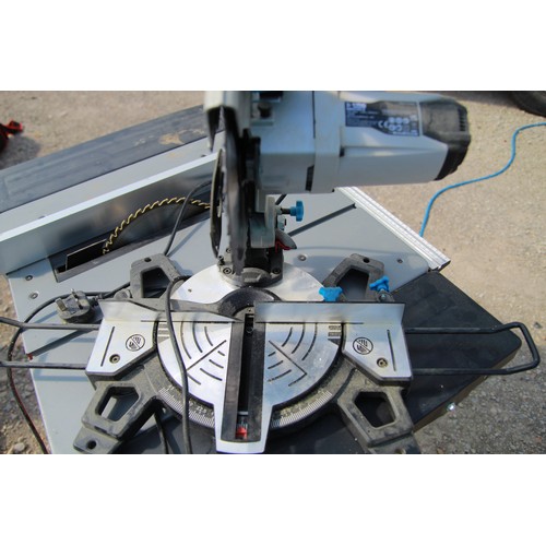 263 - A tabletop MacAllister rotary saw on stand in working order