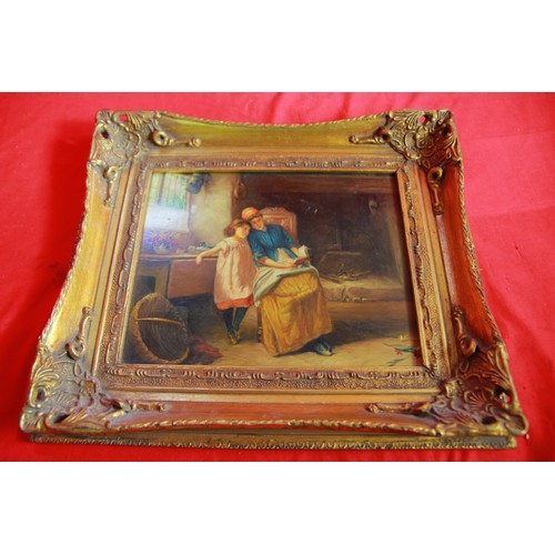 279 - A vintage picture of a mother and child in a kitchen, in an impressive gilt frame