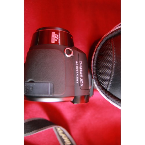 307 - A pair of Digital Cameras comprising a Fuji Finepix S6500fd in case and a Konica-Minolta Dimage Z5 i... 