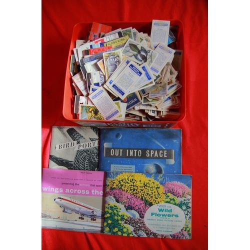 361 - A tub containing tea and trade cards and card albums including a complete Out Into Space and others,... 