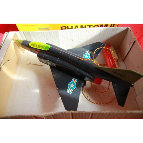 364 - A 1970s toy F-4 Phantom Jet, remote control, in original box