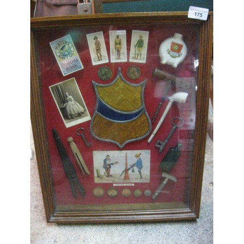 175 - An interesting framed display featuring antique items