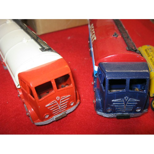 134 - A selection of vintage Dinky Toy petrol tankers comprising a pair of Foden 8-wheel tankers, repainte... 