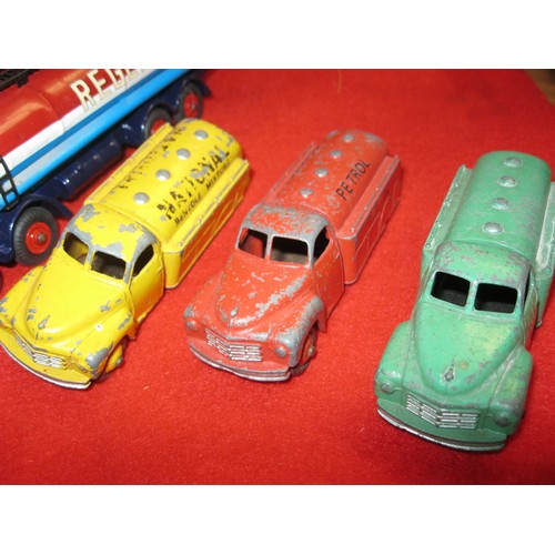 134 - A selection of vintage Dinky Toy petrol tankers comprising a pair of Foden 8-wheel tankers, repainte... 