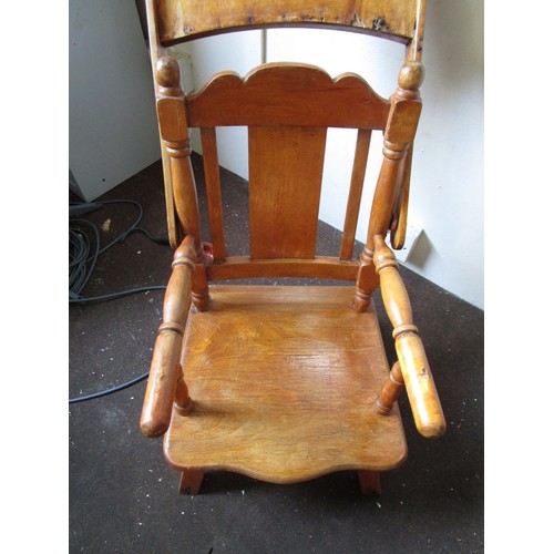 135 - An antique child's high chair with tray