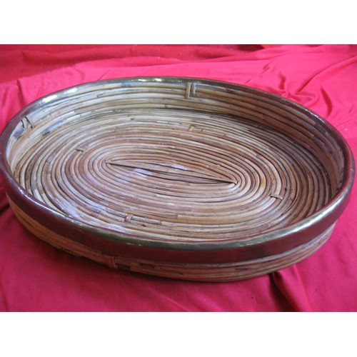 422 - An Italian brass edged bamboo or wicker tray, oval, 16