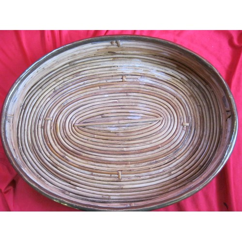 422 - An Italian brass edged bamboo or wicker tray, oval, 16