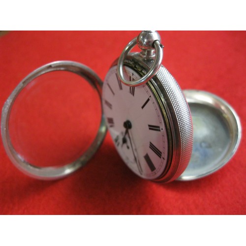 99B - A heavy sterling silver pocket watch in running order, key wind and set, hallmarked for London 1896,... 