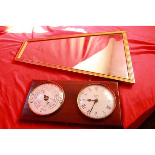 102 - A vintage wall mounted barometer and clock pair by Abbey, plus a small art deco style wall mirror