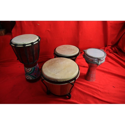 116 - One pair of Bongos and two Djembes