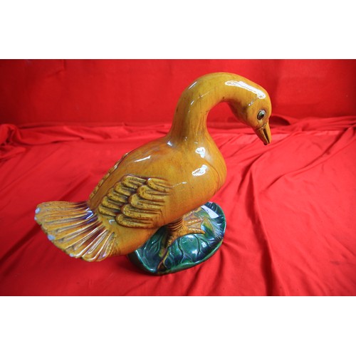 164 - A Chinese sancai glazed figure of a duck, a/f to base (past repair) 8