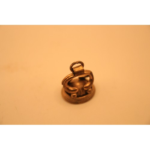 210 - An ornate 19th century fob seal, gold plated, with Roman style intaglio