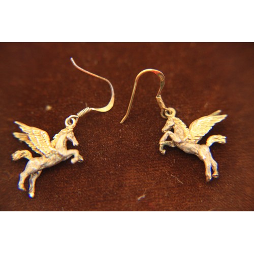 213 - A pair of silver and gilt Pegasus flying horse earrings