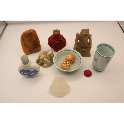 218 - A group of Chinese and Oriental items including snuff bottles