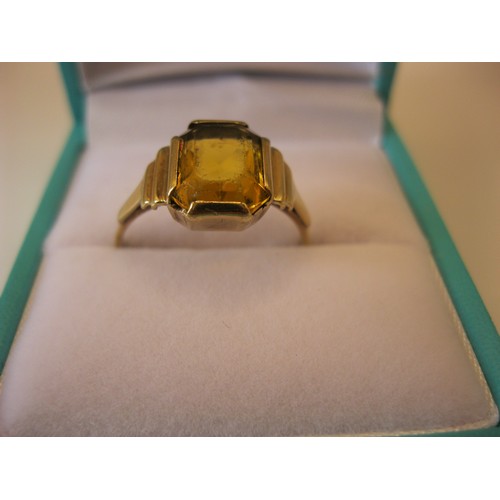 235 - A 9 carat gold ring with large citrine approx weight 2.1g, size Q/R