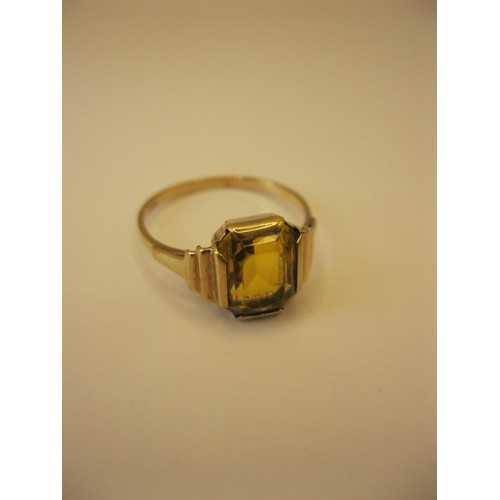 235 - A 9 carat gold ring with large citrine approx weight 2.1g, size Q/R