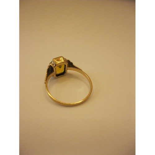 235 - A 9 carat gold ring with large citrine approx weight 2.1g, size Q/R