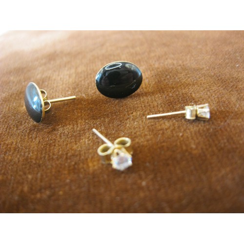 244 - 2 pairs of 9 carat gold earrings, one pair set with Jet, the other with clear stone (likely zirconiu... 