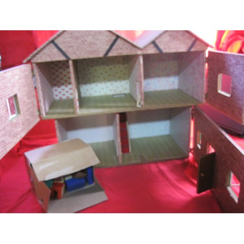 260 - A vintage doll's house and a small box of furniture for the same