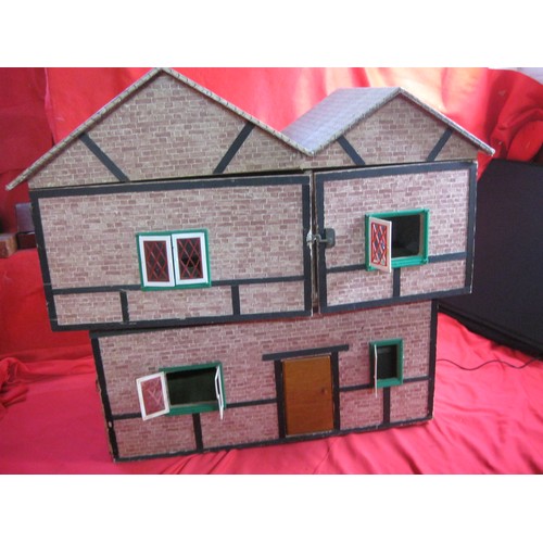 260 - A vintage doll's house and a small box of furniture for the same