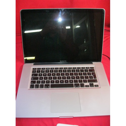 266 - A mid-2009 (according to serial number lookup) MacBook Pro, screen appears visually undamaged but no... 