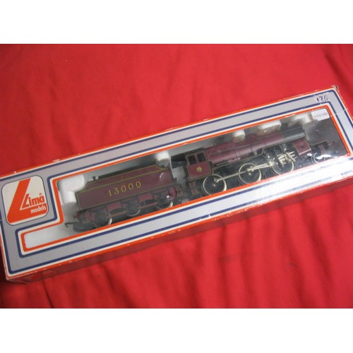 273 - A boxed Lima Models 205119 MWG British Mogul 2-6-0 #13000, box marked 'Unused', model mint, some wea... 