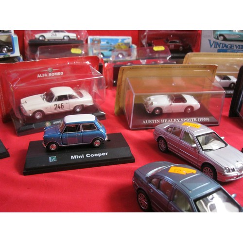 281 - An assortment of 20+ die cast vehicles, mainly in blister packs but several boxed and a few loose, i... 