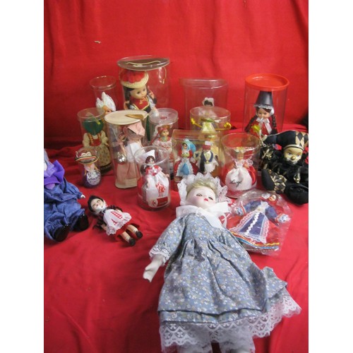 307 - A collection of dolls of the world, many in original packaging