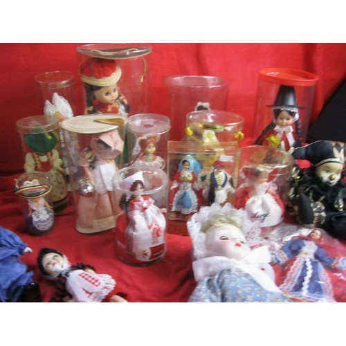 307 - A collection of dolls of the world, many in original packaging