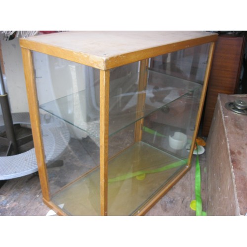 8 - A wood-framed glass shop counter display cabinet