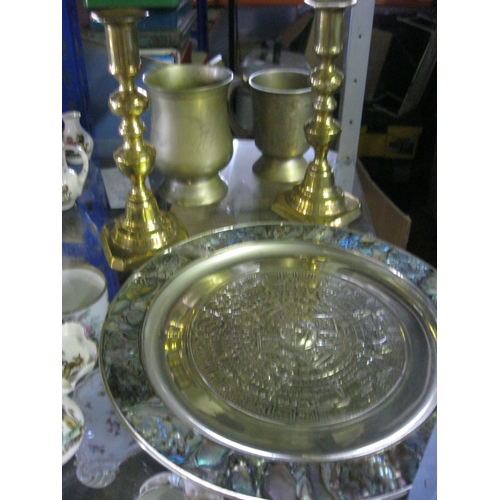 77 - A small selection of brassware including a pair of antique candlesticks and a highly decorative Egyp... 