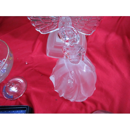 69 - A mixed selection of clear and obscure glass including a York minster boxed paperweight and two bird... 