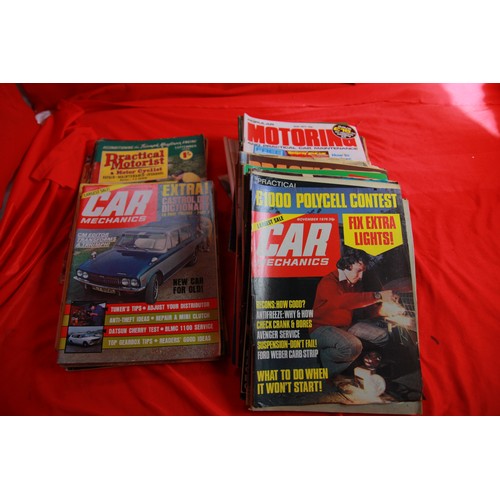 79 - A stack of vintage car magazines from the 1950s to 1980s