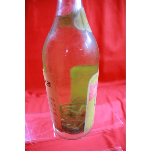 75 - A bottle of vintage Gecko Herbal Whiskey, sealed, with gecko lizard in bottle, unusual (to say the l... 