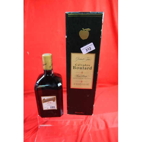 212 - A boxed 1 litre bottle of Calvados Boulard, appears sealed, plus a 1 litre bottle of Licor Triple Se... 