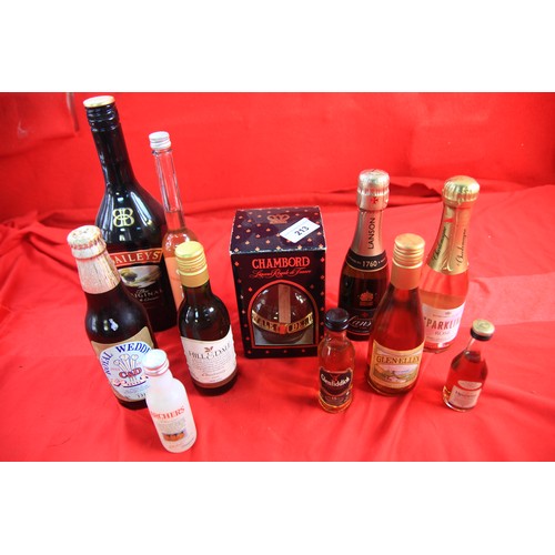 213 - A 1/4 bottle of Champagne Lanson, sealed, plus various other sealed small bottles and miniatures inc... 