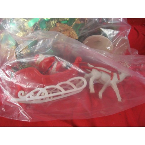 295 - A sack of Christmas decorations including Santa & Sleigh figures, door signs etc