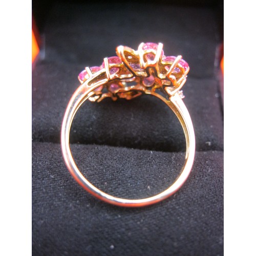 348 - A hallmarked 9 carat gold double daisy ring set with pink stones and small diamonds, approx weight 2... 