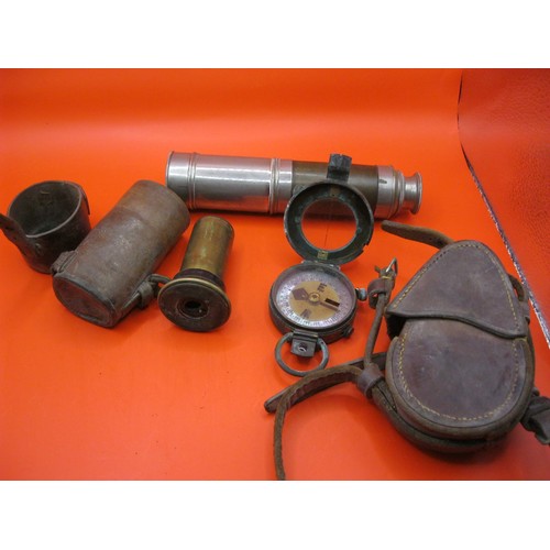 367 - A WW1 period marching compass in leather case, a small telescope and a cased lens