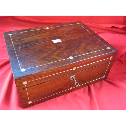 395 - A vintage inlaid wooden sewing box with key